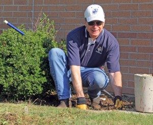 Leading by example, Dr. Rankin took part in a campus clean-up day in 2013.